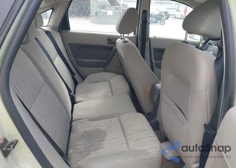 2010 Ford Focus из США, поврежденный, VIN 1FAHP3FNXAW171250